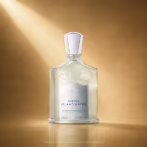Creed Virgin Island Water 100 ml profumo unisex, flacone trasparente con etichetta argento e dettagli blu in packshot luxury su sfondo dorato.