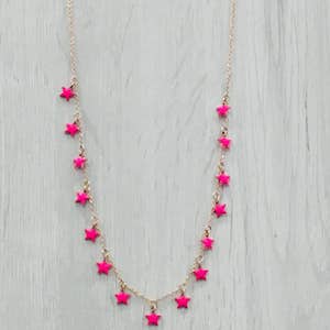 Collana Stelline by StellaBloom NY. Tendenza moda Primavera Estate 2018. Girocollo in acciaio color oro rosa cm. 40 con 15 stelline smaltate da ambo i lati.