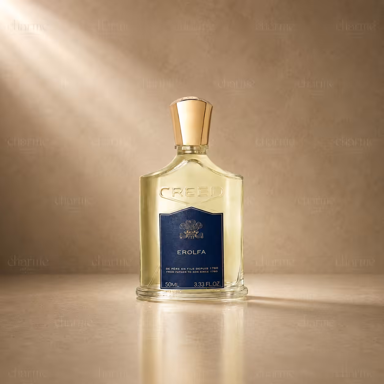 Creed Erolfa 50 ml profumo unisex, flacone trasparente con etichetta blu in packshot luxury su sfondo dorato.