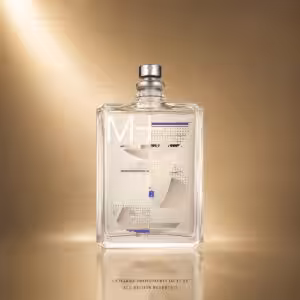 Crystal perfume bottle with a silver spray top and an abstract, geometric label on a gold backdrop.