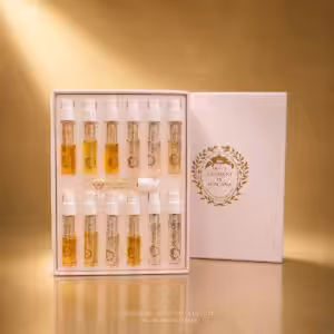 Discovery Set Giardini di Toscana Profumi Artistici, cofanetto rosa con campioni profumo di nicchia su sfondo luxury dorato