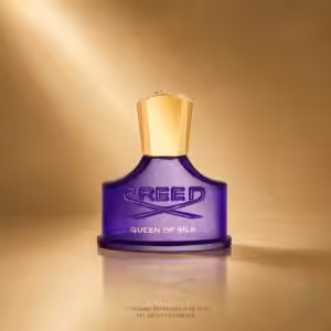 Creed Queen of Silk 30 ml profumo donna, flacone viola in packshot luxury su sfondo dorato.