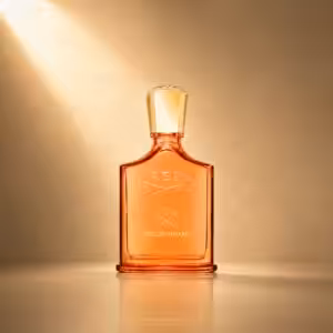 Creed Delphinus profumo unisex, flacone arancione in packshot luxury su sfondo dorato.