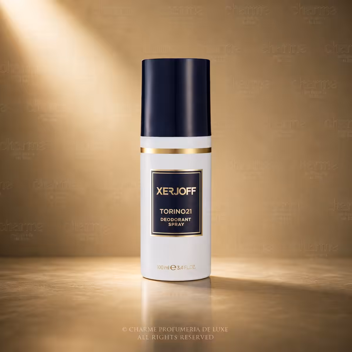 XERJOFF Torino21 deodorant spray bottle with a dark blue cap and gold label on a gold-toned surface, studio backdrop
