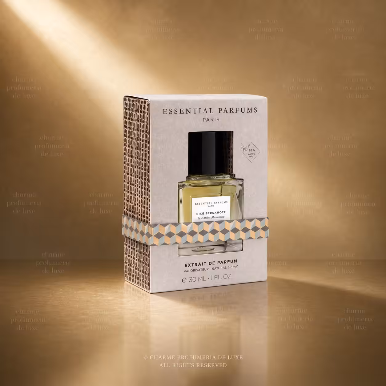 Boxed Essential Parfums fragrance with a small bottle visible inside, set against a gold backdrop.