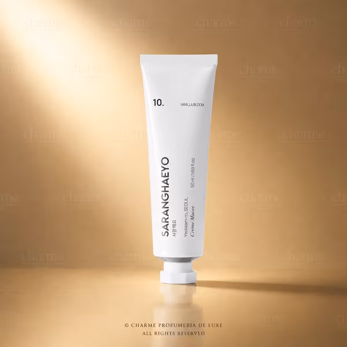 Saranghaeyo 10 Vanilla Bloom Crème Mains 50 ml, crema mani profumata in tubo bianco su sfondo luxury Charme Profumeria