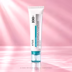 ANUA PDRN + Hyaluronic Acid 100 Moisturizing Cream da 60 ml, crema viso coreana in tubo bianco con dettagli turchesi e tappo trasparente, packshot K-Beauty su sfondo rosa cipria di Charme Profumeria.