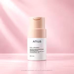 ANUA Rice Enzyme Brightening Cleansing Powder 40 g con riso e ceramide, detergente viso illuminante in polvere dal packaging bianco e rosa cipria, packshot K-Beauty luxury Charme Profumeria.