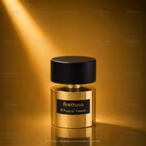 Gold perfume bottle with a black cap, Arethusa by Tiziana Terenzi, set on a reflective gold surface.
